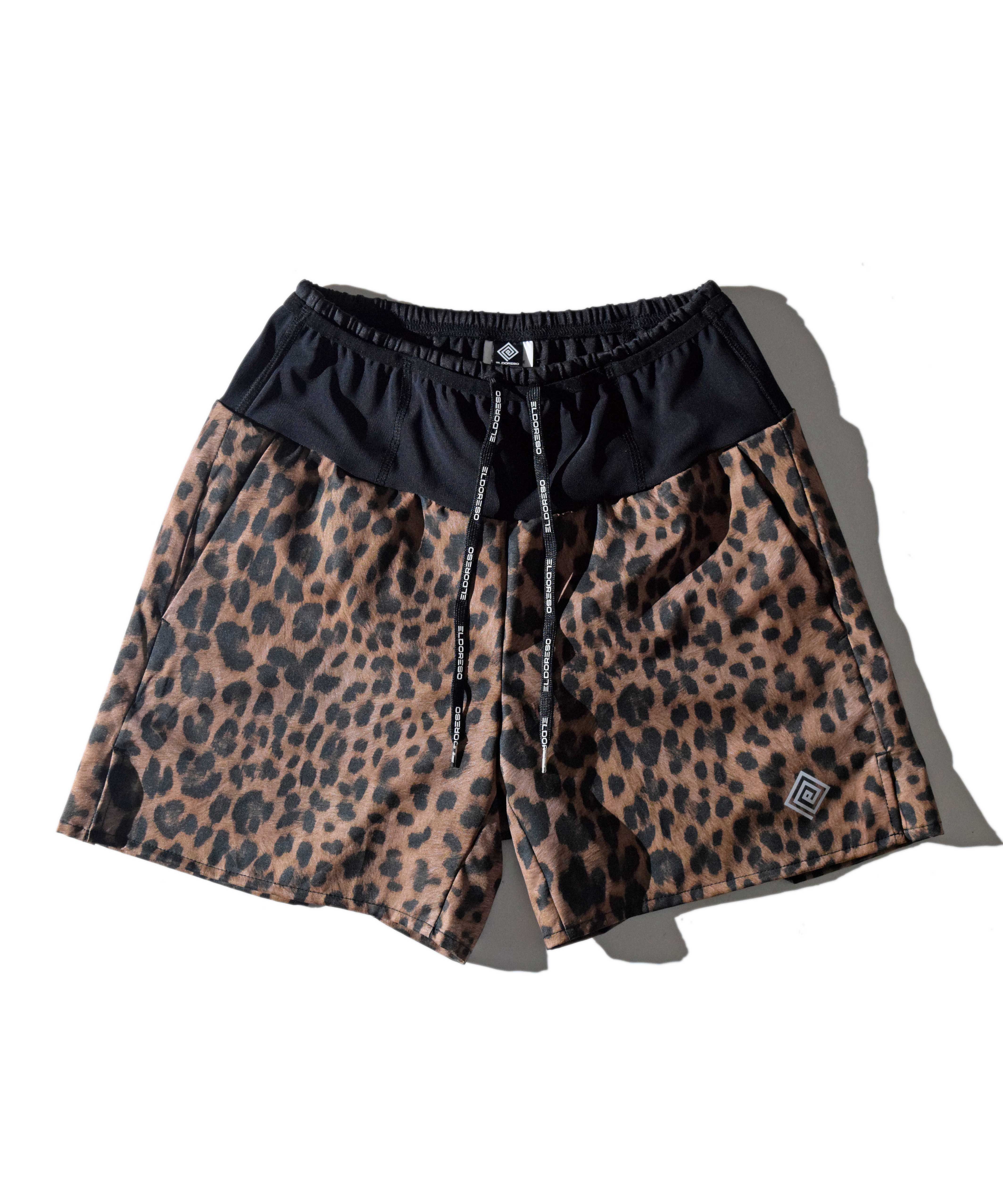 MMA&eldoresoのコラボショーツ Universal Shorts(Brown)